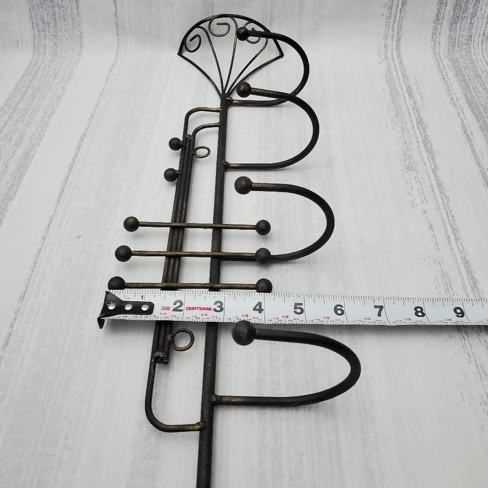 DecorativeIron Trumpet Shape Wall Hook Black w/hints of gold. 21